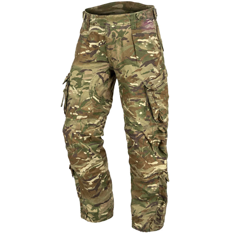 Camouflage cargo pants in a multi-terrain pattern of green, brown, tan, and black, shown on a plain white background.